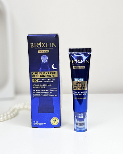 کرم ضد چروک و جوانسازوآبرسان وروشن کننده دور چشم بیوکسین Bioxcin ویژه شب مدل AGE REVERSE حجم 15 میل