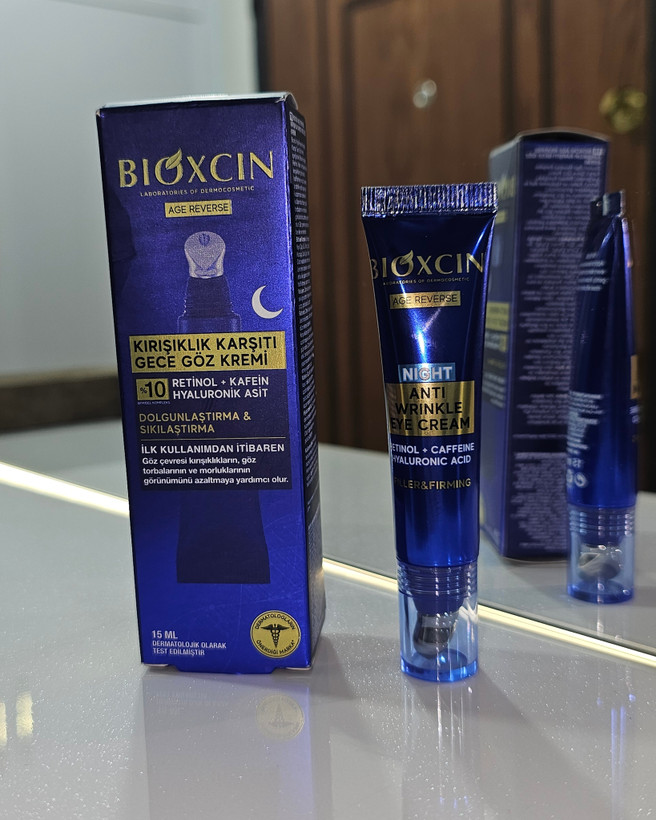 کرم ضد چروک و جوانسازوآبرسان وروشن کننده دور چشم بیوکسین Bioxcin ویژه شب مدل AGE REVERSE حجم 15 میل